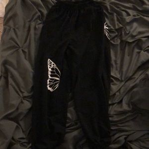Black Seeatpants With White Butterflies